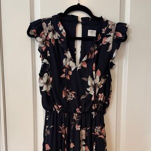 Sienna Sky Navy Floral jumpsuit with Ruffle Shoulders